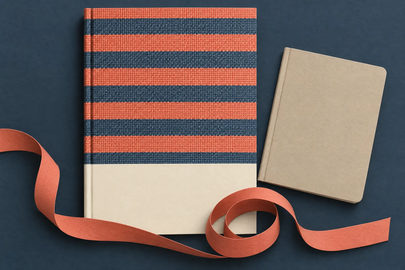 A weave studio still life of a ebook product arranged with a coiled coral ribbon, in coral, sand, slate, and cream.