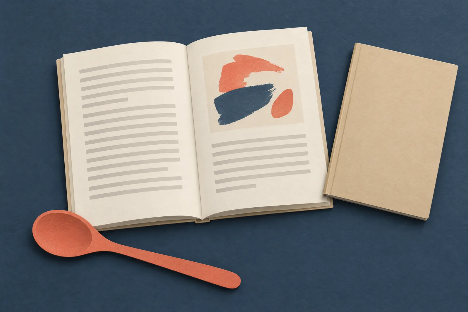 A map room still life of a book product arranged with a wooden spoon, in coral, sand, slate, and cream.