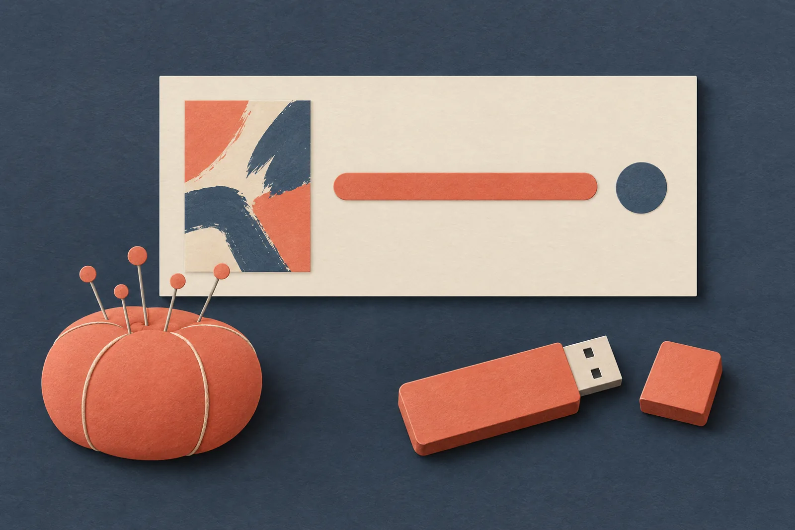 A mudroom bench still life of a software product arranged with a round pin cushion, in coral, sand, slate, and cream.